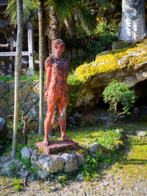 Vibrant sculpture garden blends nature, art harmoniously.