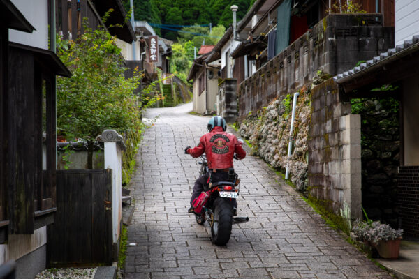 Traditional Japanese Alley with Red Motorcycle