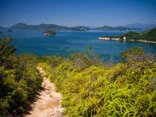 Lush coastal trail to turquoise paradise isles