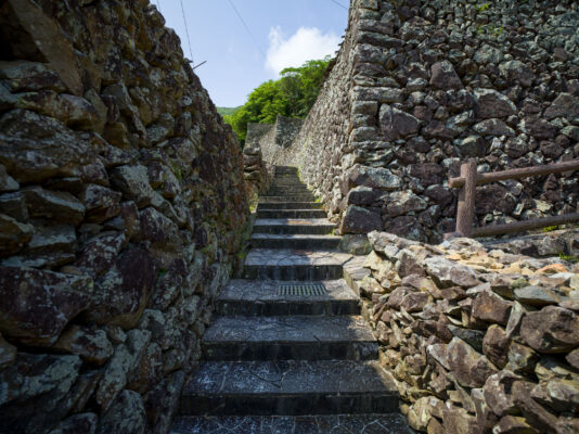 Winding ancient stone pathway in Sotodomari Ishigaki-no-sato.